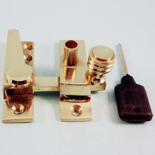THD184L/PB • Locking • Polished Brass • Locking Straight Arm Reeded Knob Sash Fastener